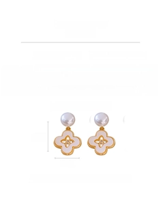Detailed view of 18k gold plated clover earrings with pearl and shell inlay measurements