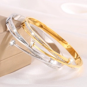 Luxury gold and silver titanium steel nail bracelets with cubic zirconia pavé details