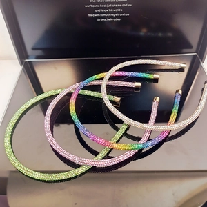 Elegant thin headband with shimmering colorful rhinestones and gold metal tips