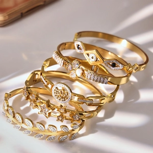 5Pcs stainless steel 18k gold plated bangle set with clover, tree of life and star motifs