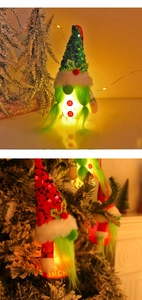 Close-up of glowing faceless gnome ornaments with sequin hats and warm LED lights