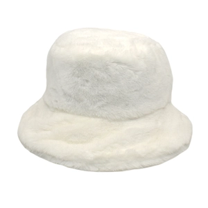 Close-up of white plush faux fur bucket hat with soft texture and minimalist winter style