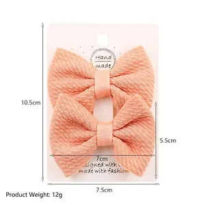 Set of two peach pink bubble fabric bow hair clips for girls with size measurements