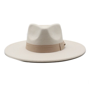 Classic wide brim fedora hat in cream wool felt with tan ribbon band for autumn style