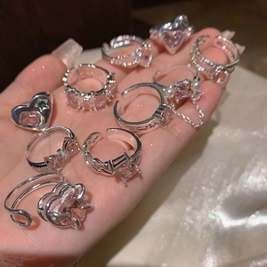 Silver ring set featuring pink heart zircon, bow designs, and pearl accents for women