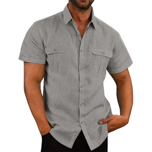 Detail view of grey short-sleeve linen shirt showing fabric texture and pocket design