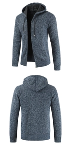 Close-up detail of dark blue thick knit cardigan with warm fleece lining and hood
