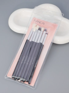 Detail of 7-piece RC fiber eye makeup brush set with black handles and silver ferrules