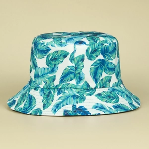 Detailed view of the reinforced stitching and tropical leaf print on this bucket hat