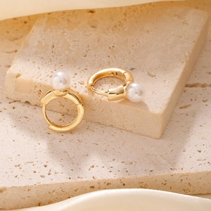 Elegant gold hoop earrings featuring polished finish and white pearl inlay for women