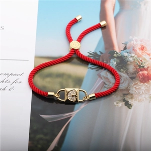 Adjustable red rope bracelet with a gold-plated zircon lock charm in Brazilian style