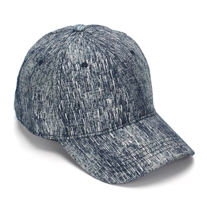 Detail shot of the blue and white mottled texture on a classic denim baseball cap
