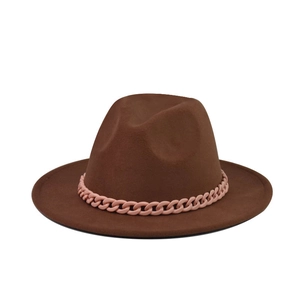 Detail of dark brown wool fedora hat featuring a chunky light pink resin chain decorative band