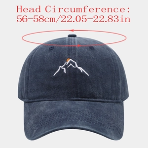 Detail of navy blue washed cotton baseball cap with mountain peak embroidery and sizing info