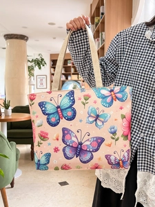 Ethnic floral canvas tote bag with butterfly print and spacious shoulder handles
