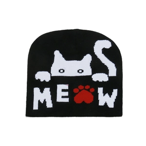 Winter black knit beanie featuring a white jacquard cat pattern and MEOW text