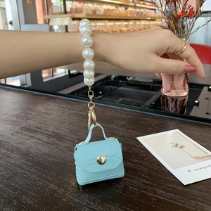 Light blue faux crocodile leather mini bag keychain with white pearl wrist strap charm