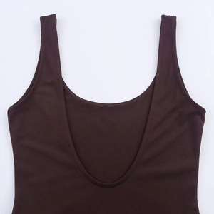 Detail of chocolate brown sleeveless bodysuit featuring a deep U-neckline and knit texture