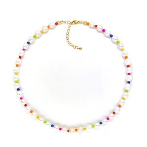 Bohemian pearl necklace with colorful beads and gold clasp on a clean white background