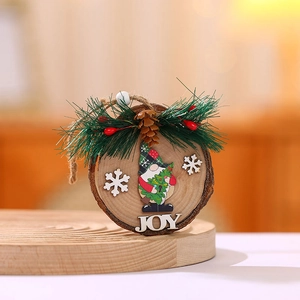 Rustic round wooden Christmas gnome ornament with pine needles and JOY lettering