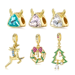 Christmas S925 sterling silver charms featuring gold reindeer and tree with colored zircons