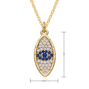 Macro shot of 18K gold evil eye pendant with blue zircon micro-paving, size 20mm x 10mm