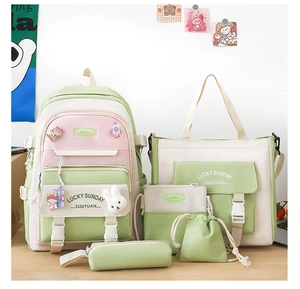 Detailed five-piece school backpack set in avocado green and pink with Lucky Sunday text
