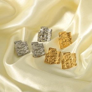 Irregular geometric pleated earrings in 18K gold and silver finishes on silk