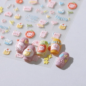 3D embossed nail stickers featuring cute pink pig, strawberry, and cupcake designs