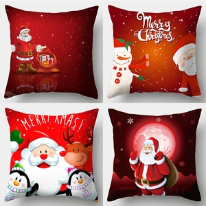 Set of four red Christmas pillow covers with cartoon Santa, Snowman and Reindeer patterns