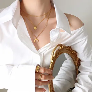 French retro gold celestial necklace set with sun star pendant and moon charm jewelry