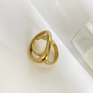 Polished 18K gold geometric multi-layered wrap ring for women in a minimalist style