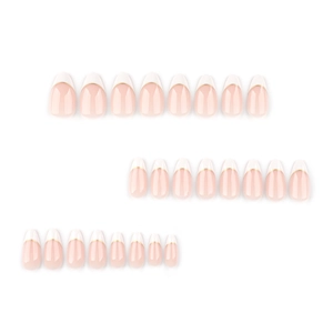 Short almond French nails in nude pink with white tips and delicate golden lines
