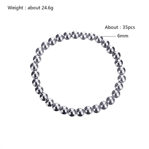 Detail of 6mm silver stainless steel beaded elastic bracelet showing 35 polished round beads