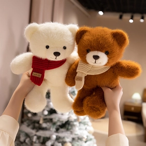 Plush teddy bears with smile knitted scarves in cream and caramel brown for gift giving