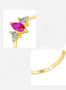 Detail of S925 sterling silver ring with marquise ruby gemstone and white zircon stones