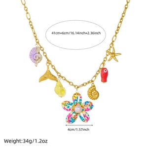 Gold ocean necklace with colorful seashell, starfish and flower charms for women