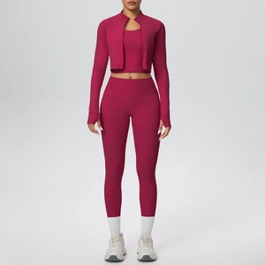 Detailed view of women's berry red three-piece yoga set with zip jacket and leggings