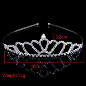 Detail shot of heart-shaped crystal crown showing 3.2cm height and 11cm width dimensions