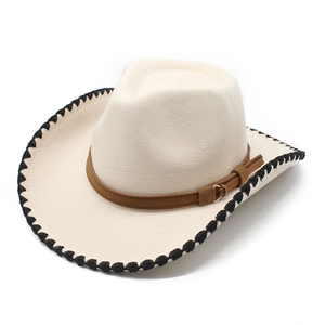 Wide brim cream wool fedora hat with brown leather band and black stitched edges