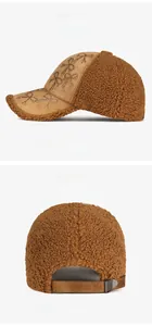 Detail of brown fleece baseball cap featuring rhinestone bow and adjustable metal buckle
