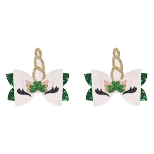 Pair of glitter unicorn hair clips with white bows and green clovers for St. Patrick's Day