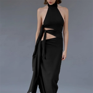Detailed close-up of the hollow-out waist and side lace-up design of the black halter dress
