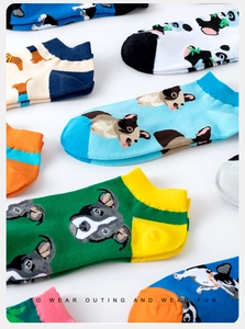 Detailed view of colorful low cut socks with cute animal prints like panda and bulldog