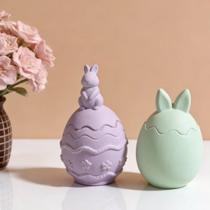 Detailed view of pastel Easter bunny egg resin storage jars with floral relief patterns