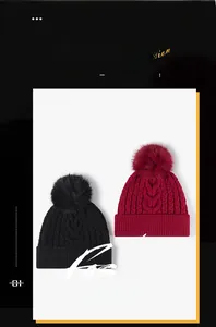 Detailed cable knit texture and faux fur pompom on thick thermal winter beanies