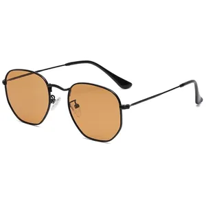 Modern hexagonal sunglasses with slim black metal frames and tinted orange lenses