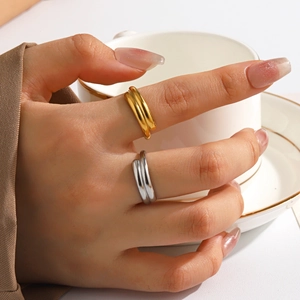 Minimalist double-layered gold and silver rings for women with an open geometric design