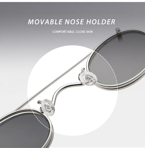 Detail view of movable silicone nose pads on punk style metal sunglasses frames