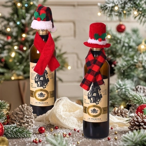 Two sets of Christmas wine bottle covers with red plaid hats and festive scarves decor